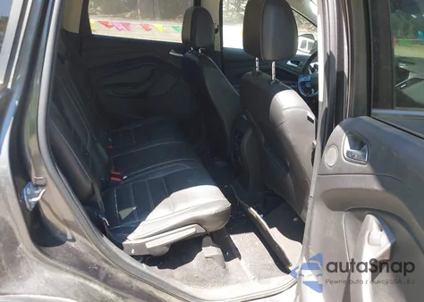 2017 Ford Escape Titanium z USA, uszkodzony, nr VIN 1FMCU9JD5HUD71601